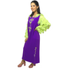 Modern Moroccan djellaba with beadwork embroidery and pattern in the hands